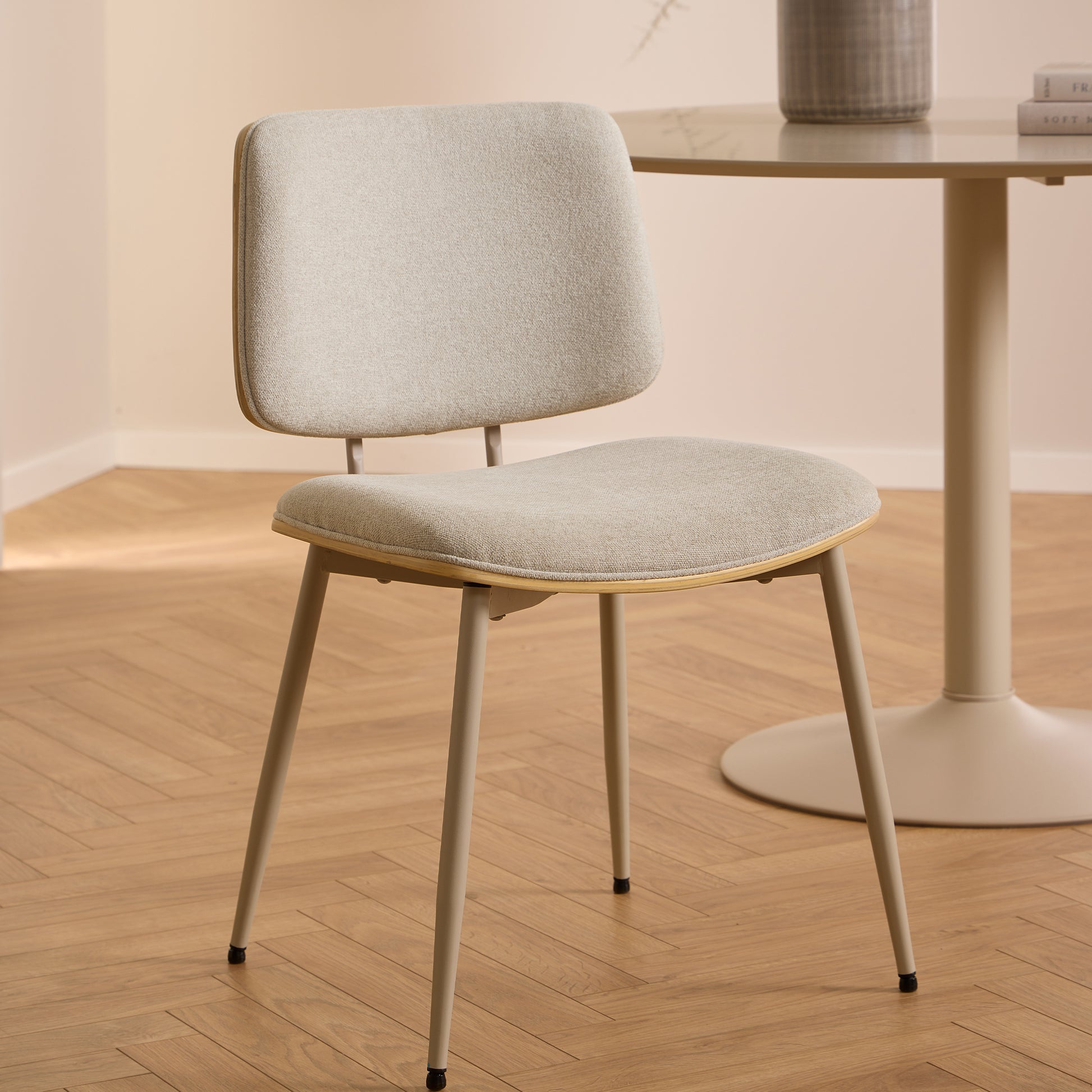 Beige chair with wooden legs 