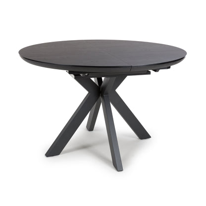 Kaelon Extendable Round Dining Table in Black Ash Oak