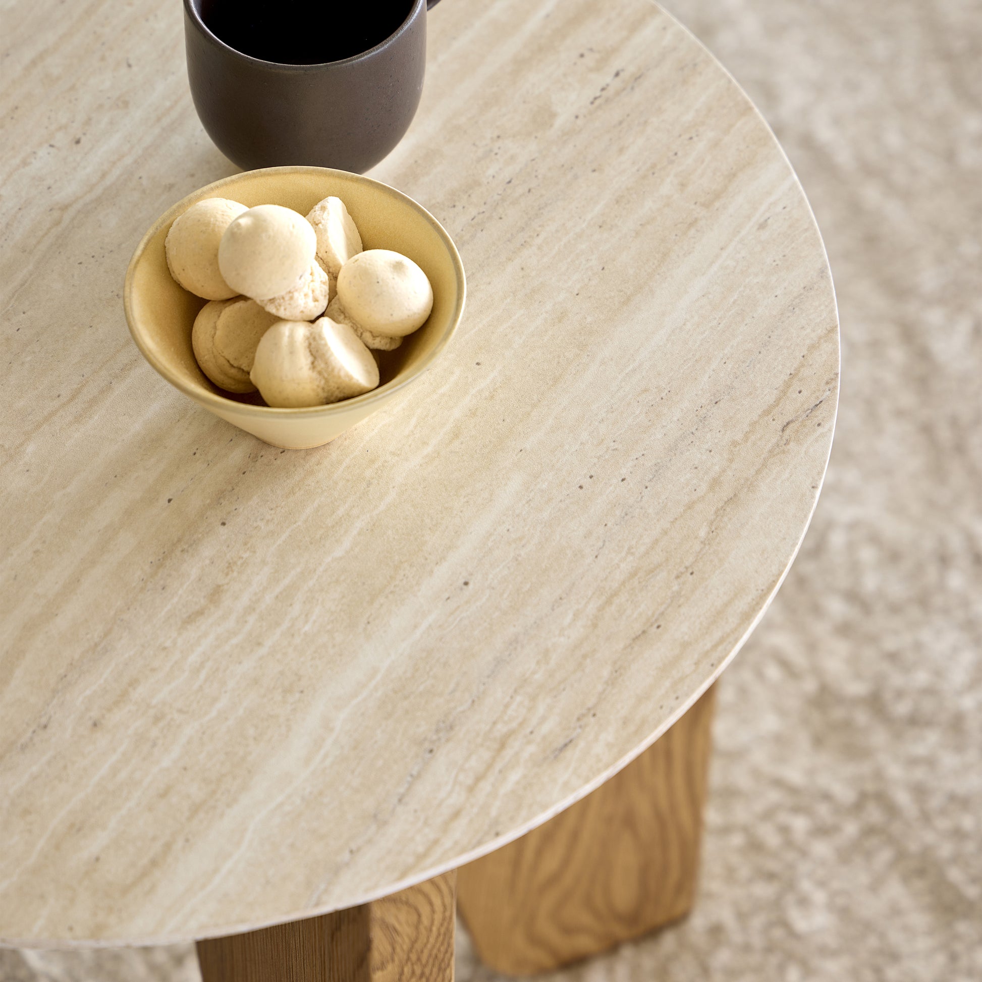 Litho side tables in travertine and wild oak with round shape and compact design for living rooms and bedrooms