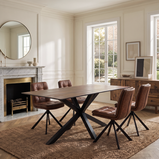 A rectangular dining table with a rusty ceramic top and black metal X-shaped base.